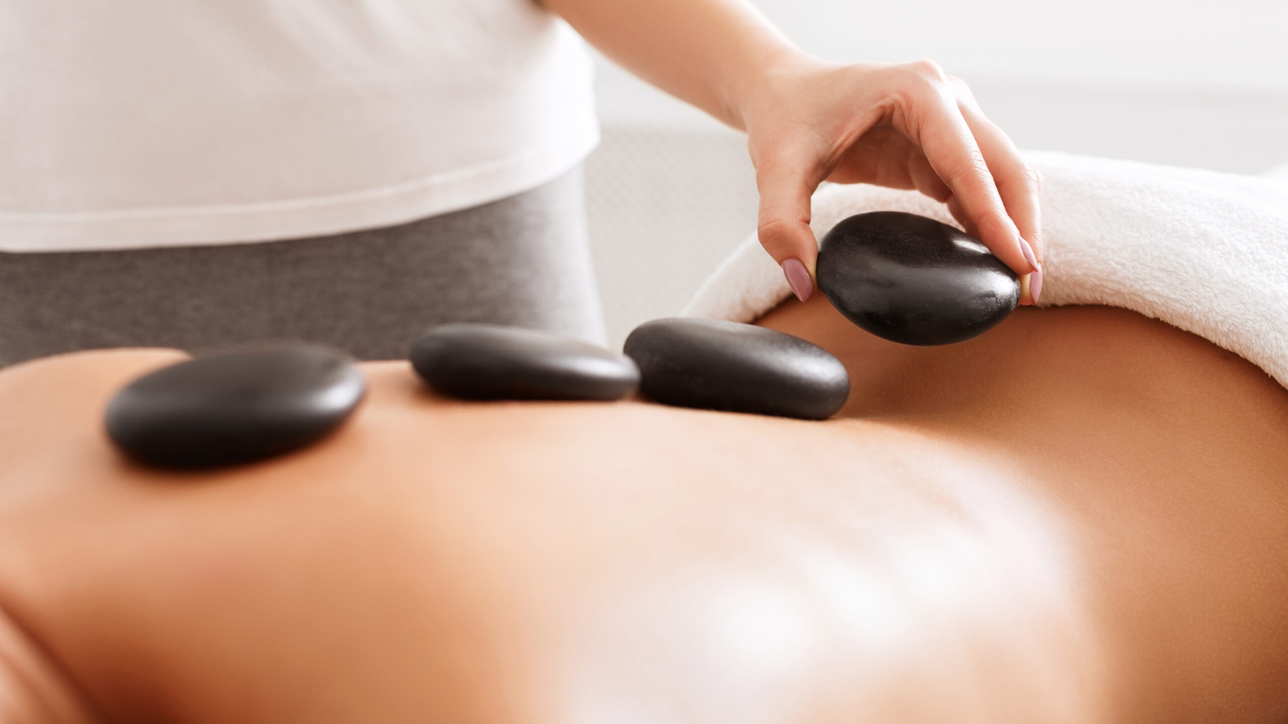 Stone therapy and deep tissue massage